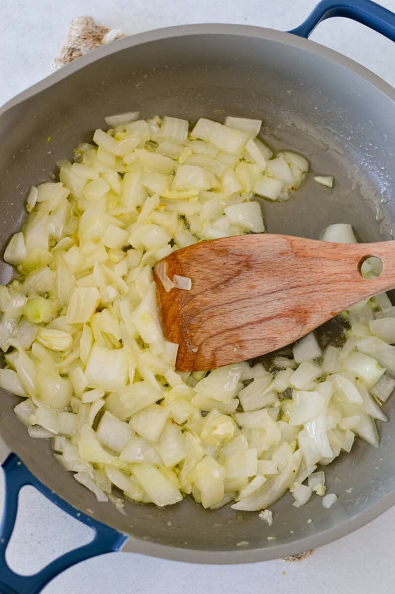 Cooking onions and garlic in butter.