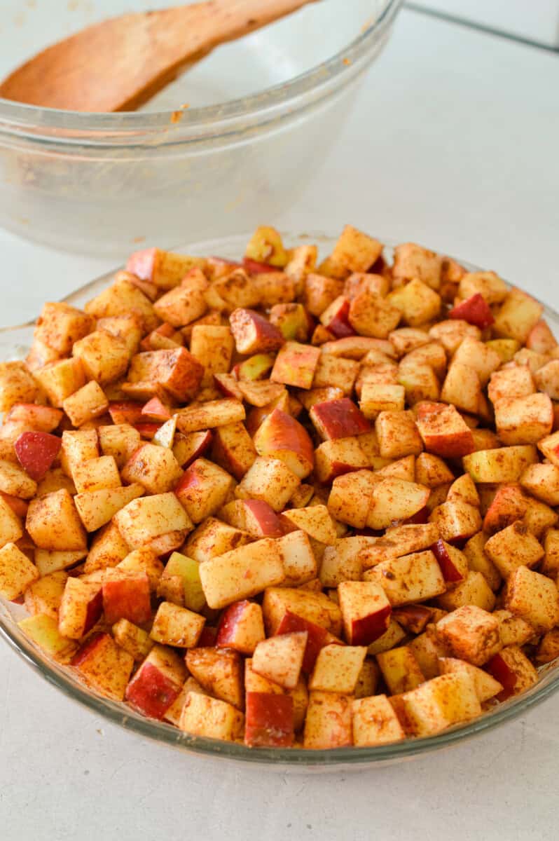 Bowl of diced cinnamon apples.