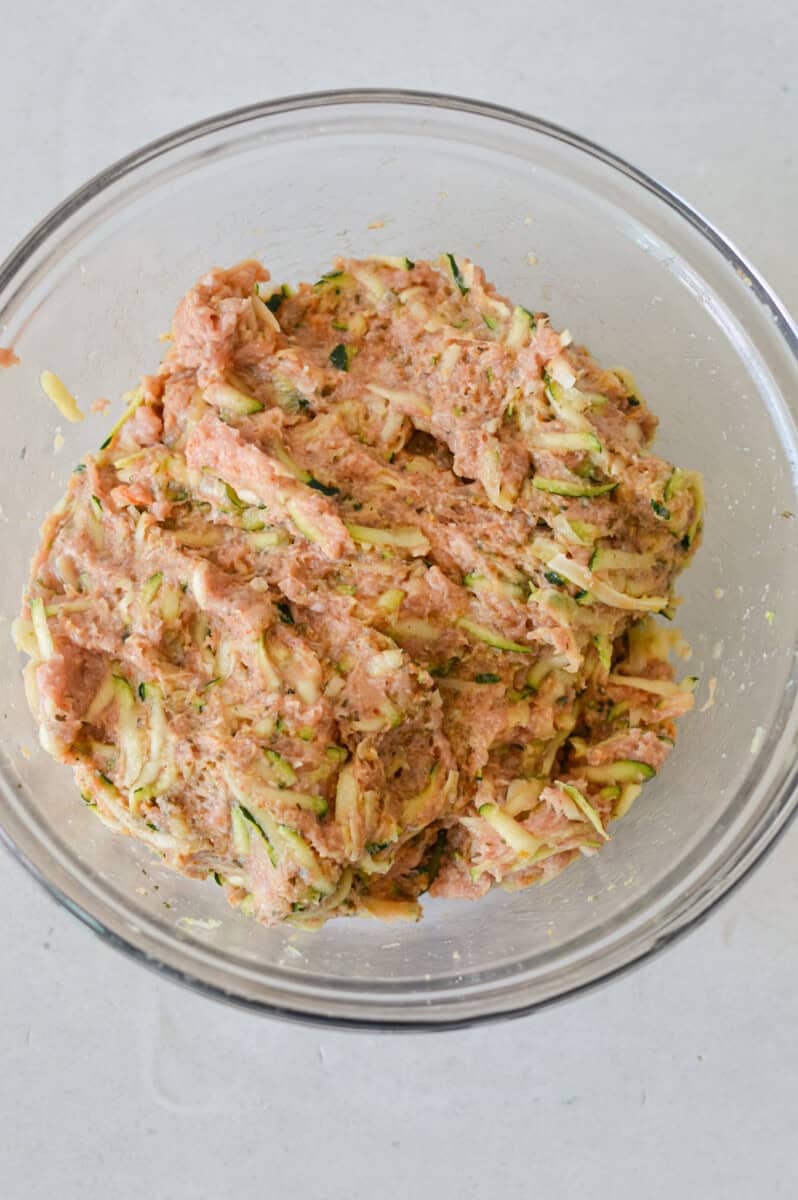 Bowl with zucchini turkey meatball mixture.