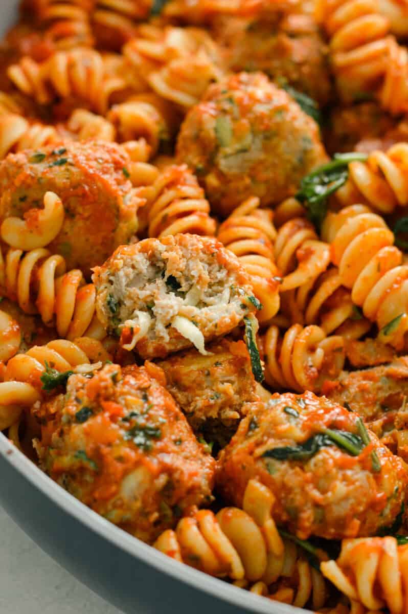 Pasta with red sauce and zucchini turkey meatballs.