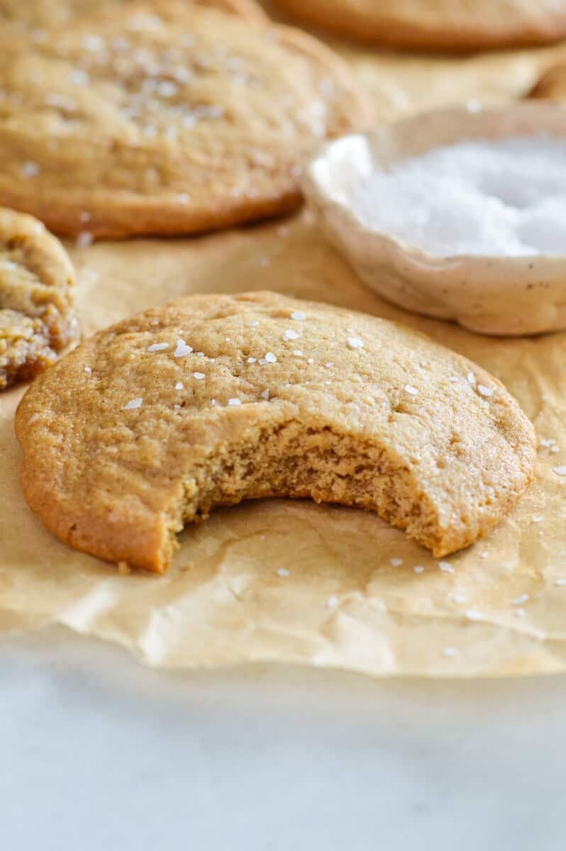 Close up of chocolate chipless cookie with a bite.