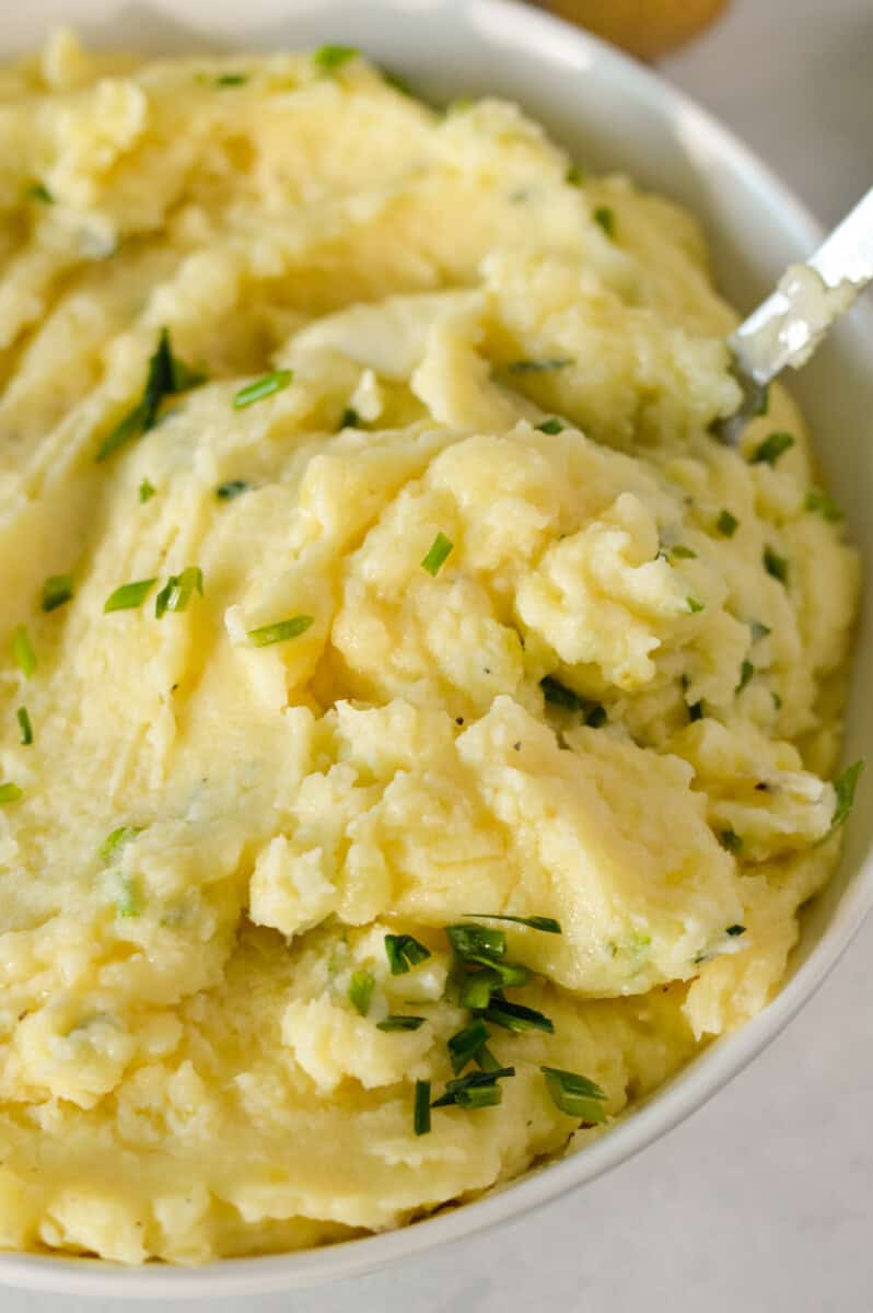 Close up of yukon gold mashed potatoes.
