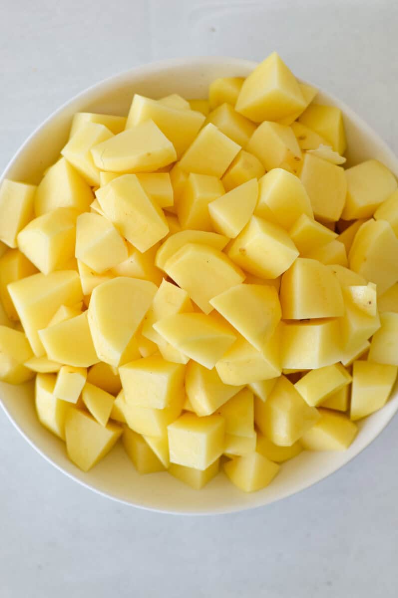 Bowl of diced potatoes.
