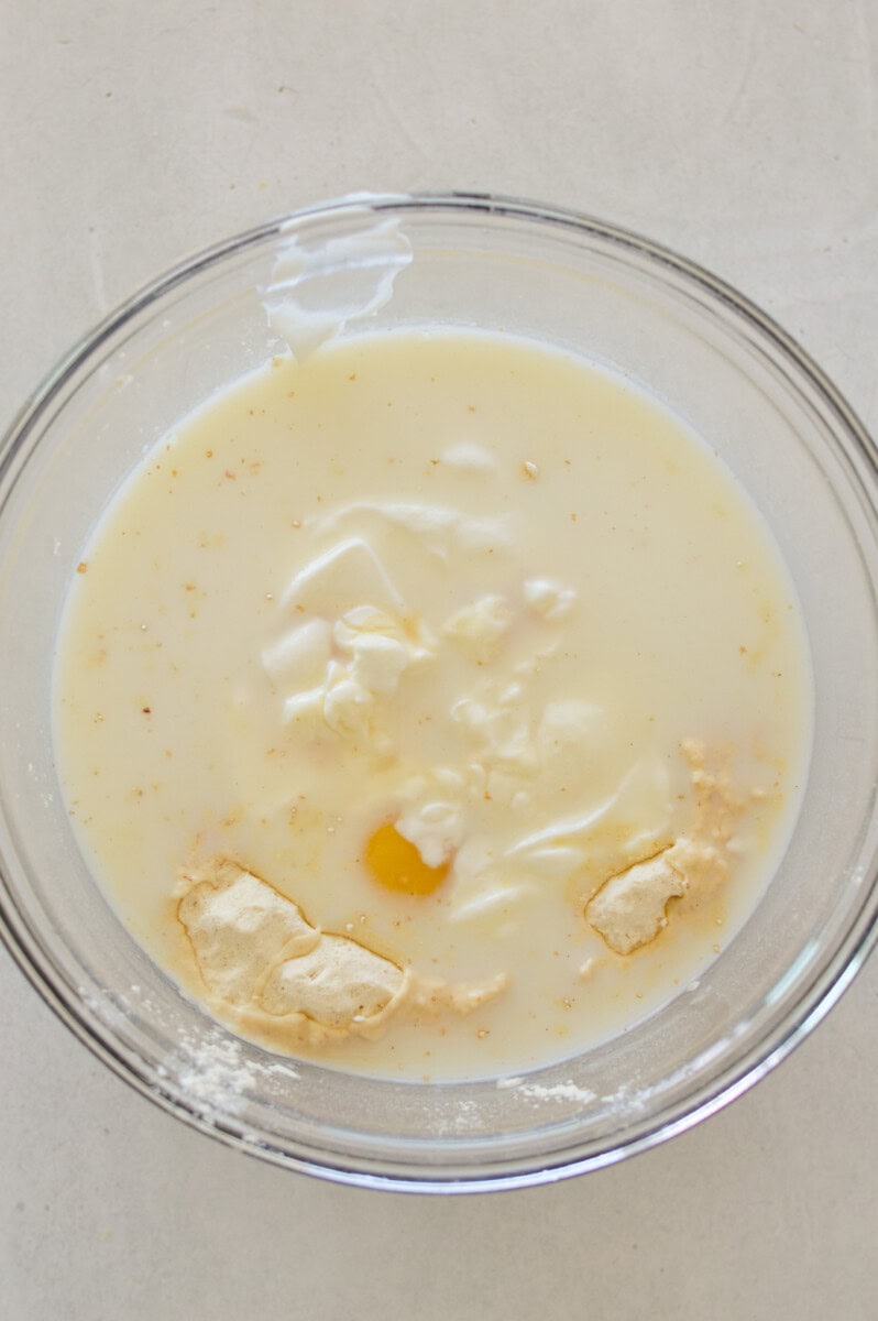 Mixing pancake ingredients together.
