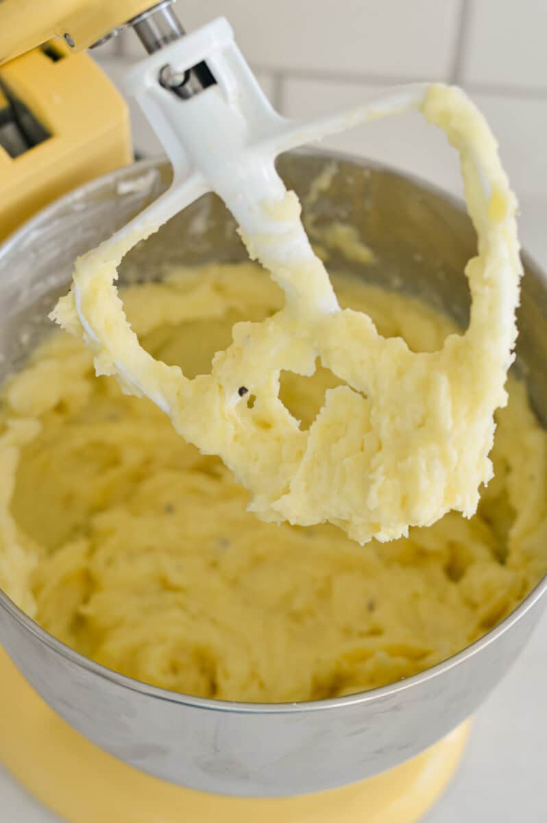 Mixing mashed potatoes in a stand mixer.