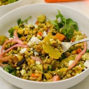 Bowl of warm roasted vegetable salad.