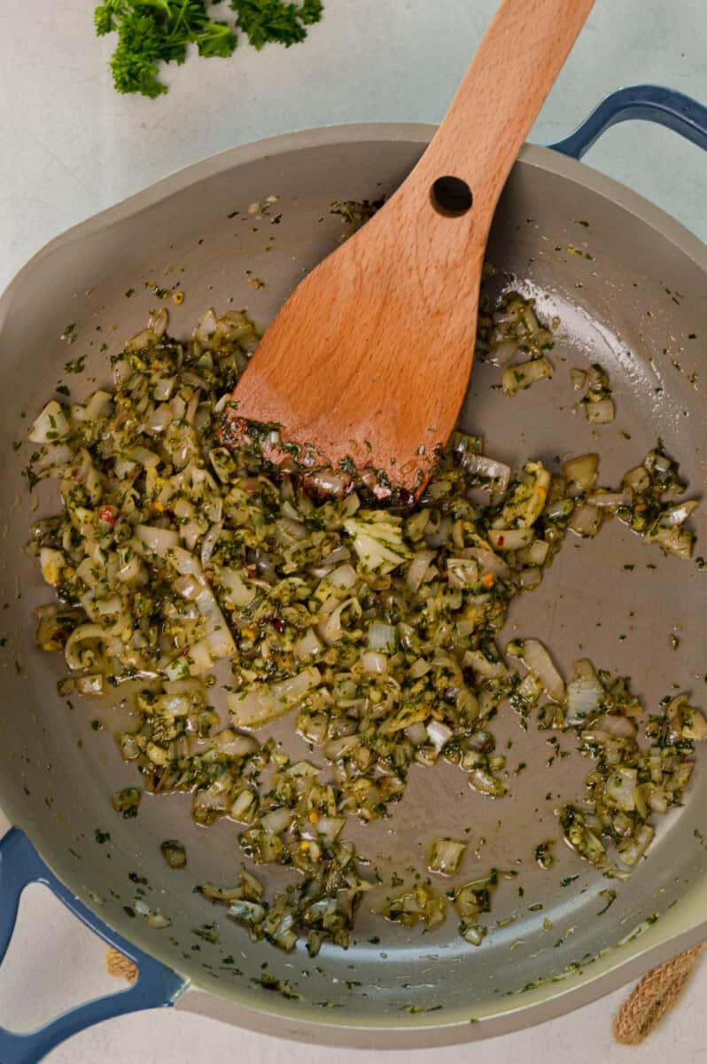 Cooking shallots and onion in butter.