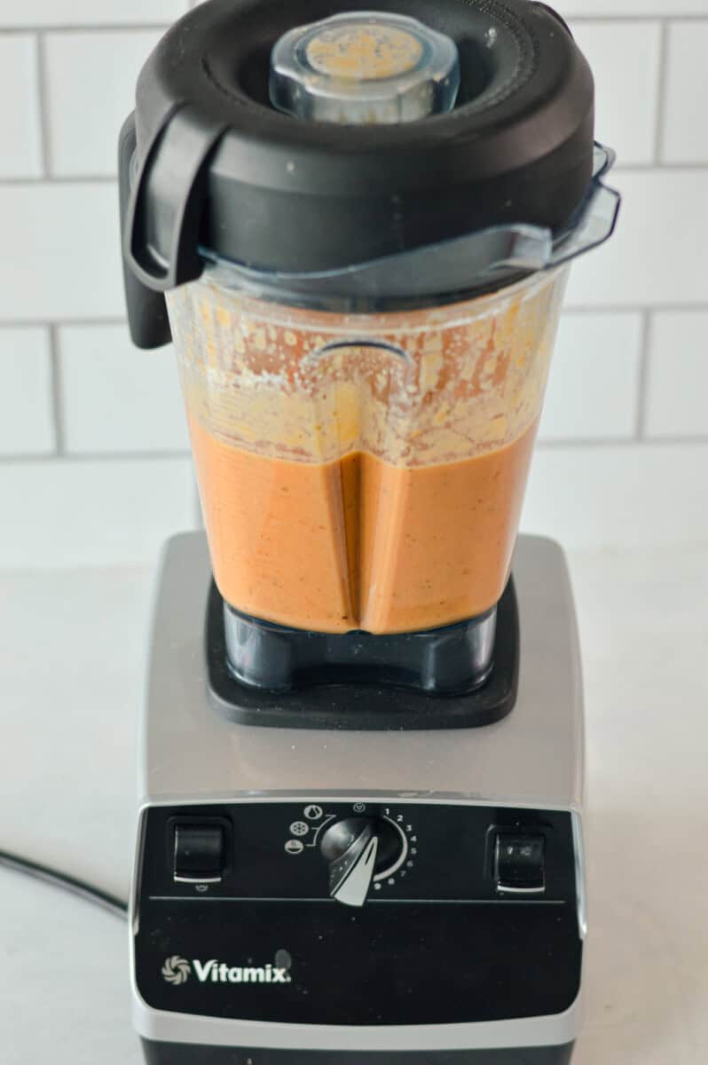 Blending roasted tomato pasta sauce.