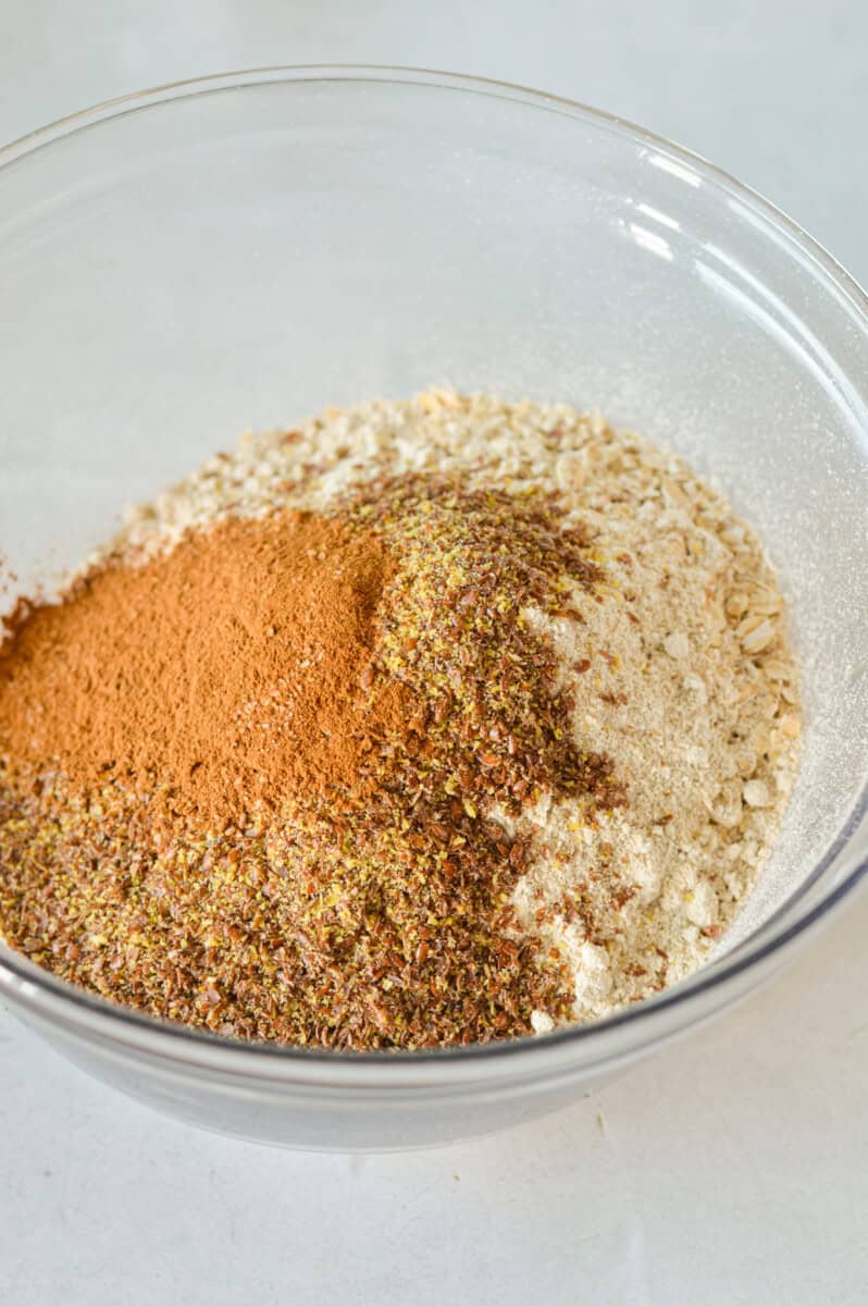 Mixing oats, oat or almond flour, ground flax seed, cinnamon and salt in a large bowl. 
