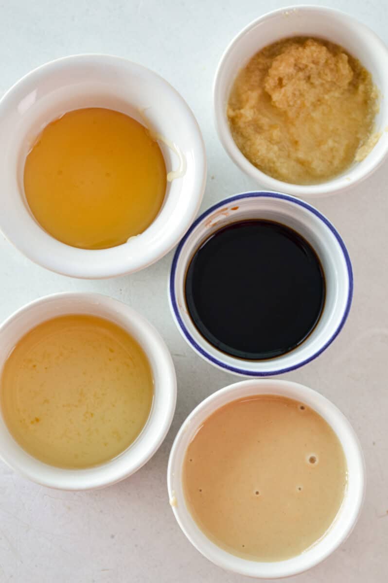 Ingredients including tahini, ginger, rice vinegar, soy sauce and honey.