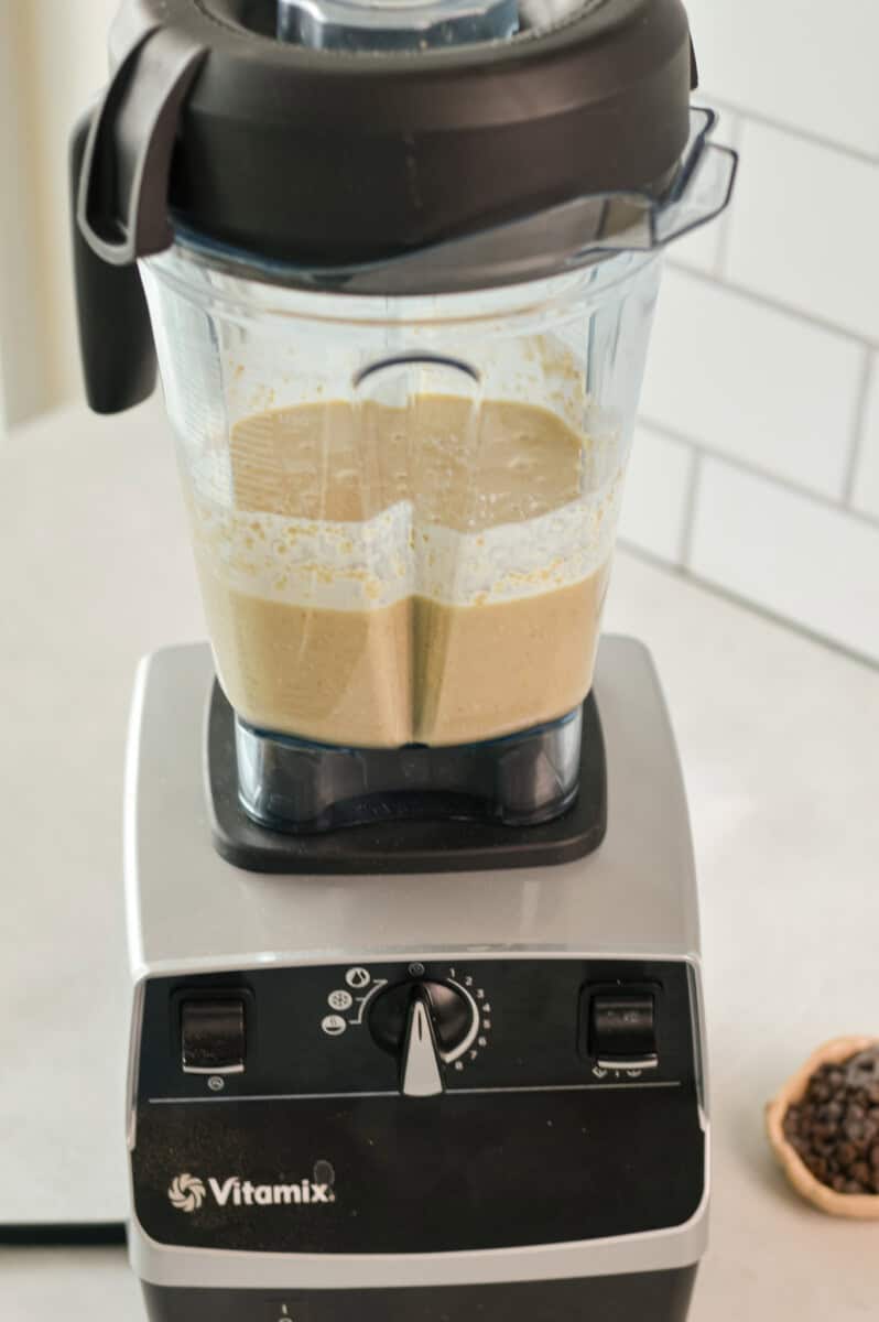 Blending banana protein muffin batter.