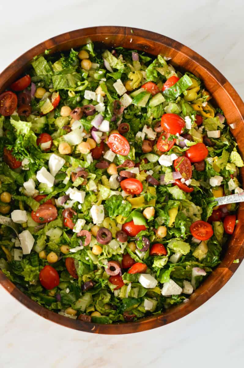 Birds eye of bowl with chopped Mediterranean salad.