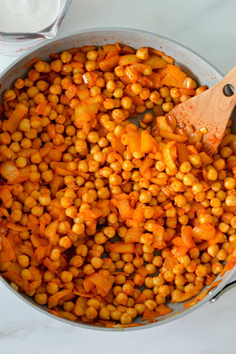 Birds eye view of chickpeas simmered in coconut milk curry.