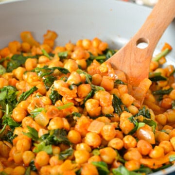 Close up of chickpea and spinach curry.