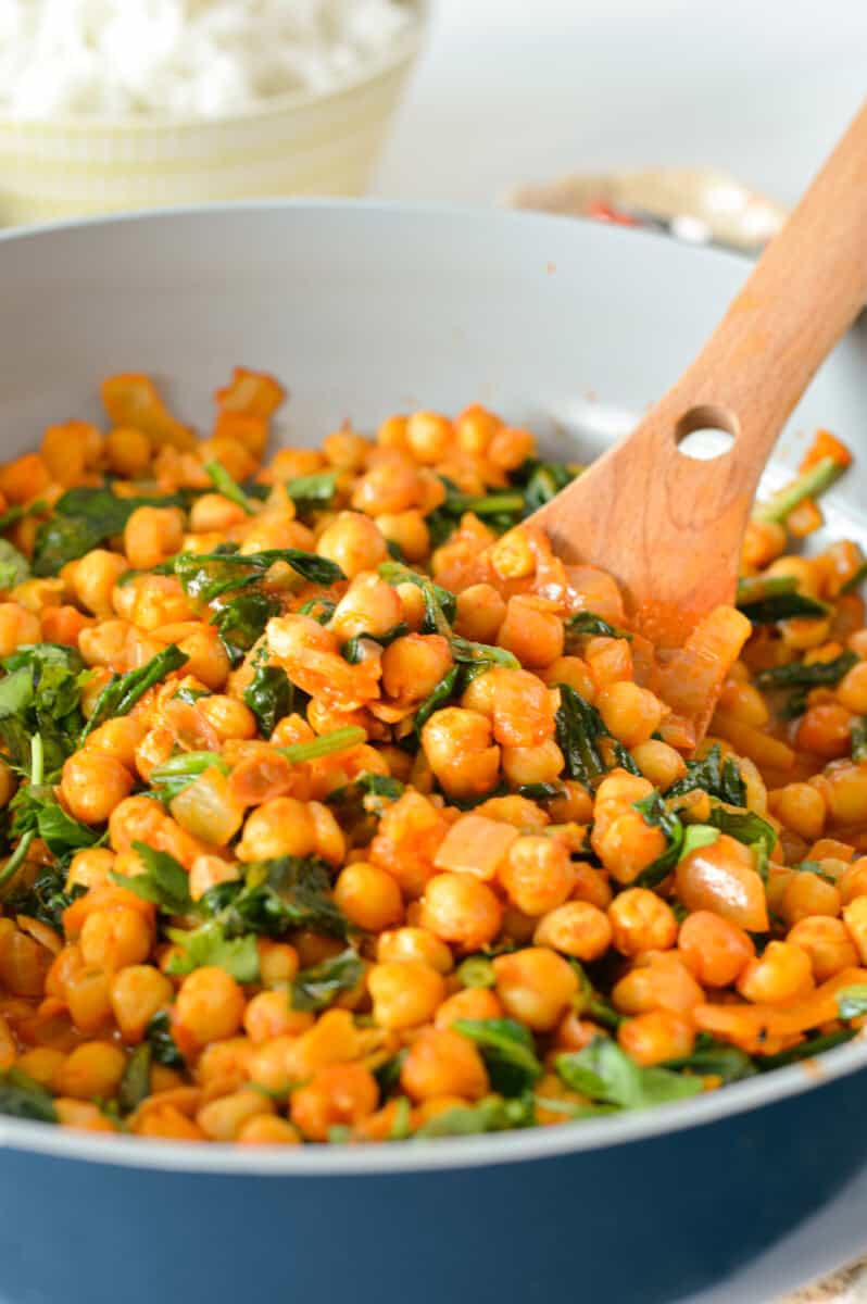 Close up of chickpea and spinach curry.