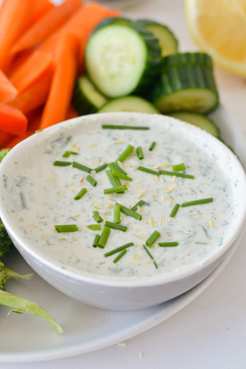 Close up of cottage cheese ranch dip, topped with chives.