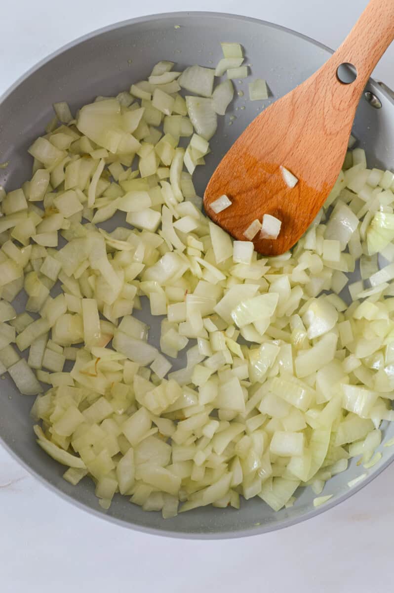 Sauteeing onions in a pan.