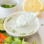 Spooning cottage cheese ranch dip.