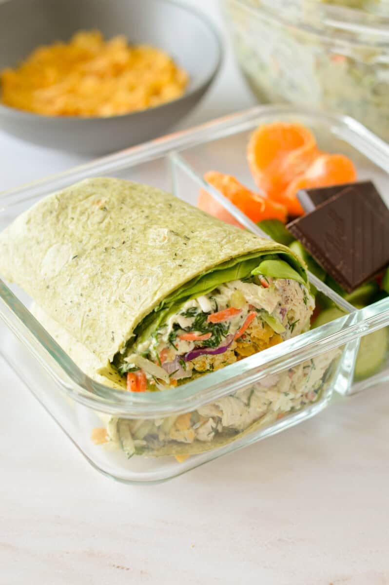 Adult lunchable with crunchy chicken wrap, served with veggies.
