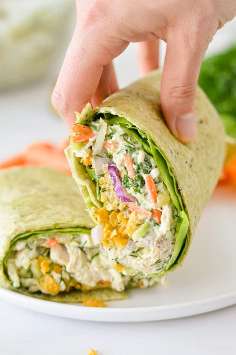 Picking up a crunchy chicken wrap.