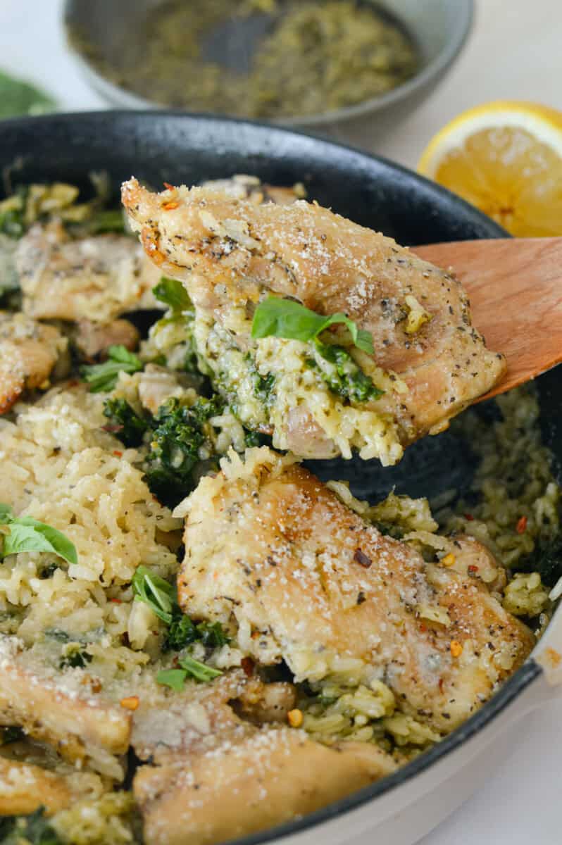 Serving chicken thighs and rice.