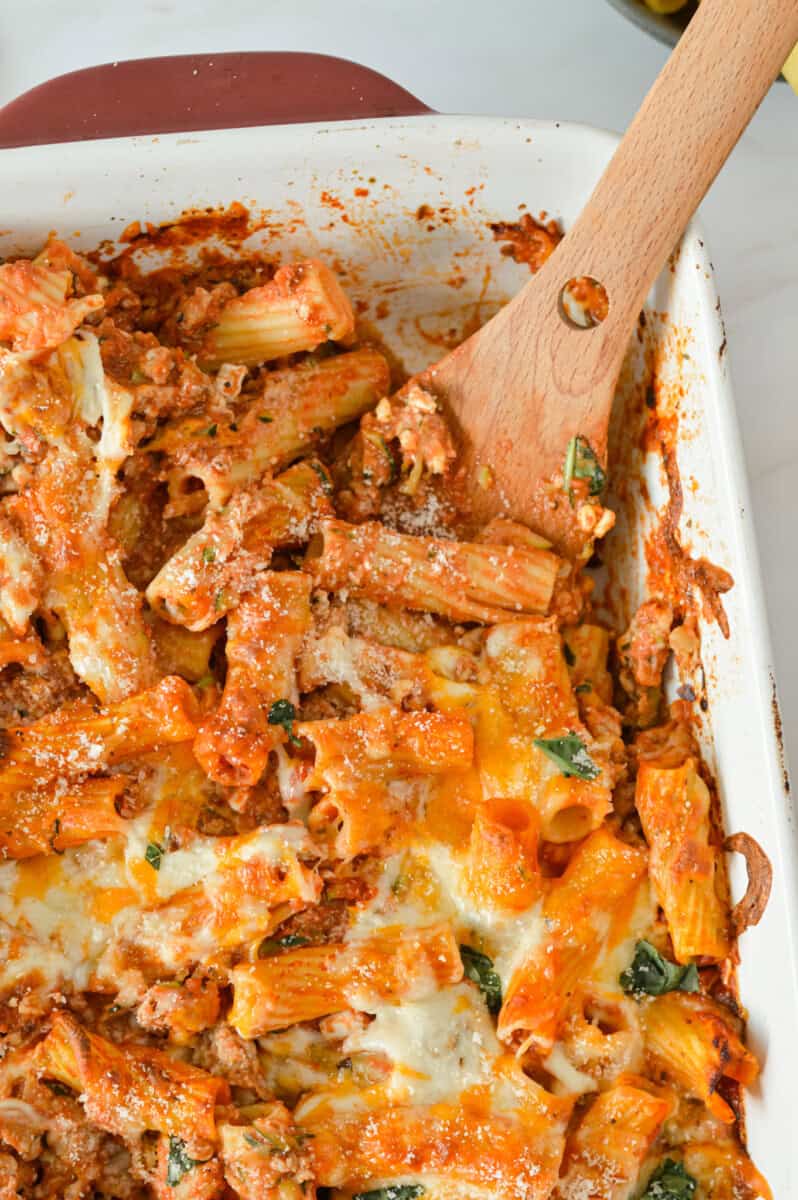 Serving a sausage pasta bake.