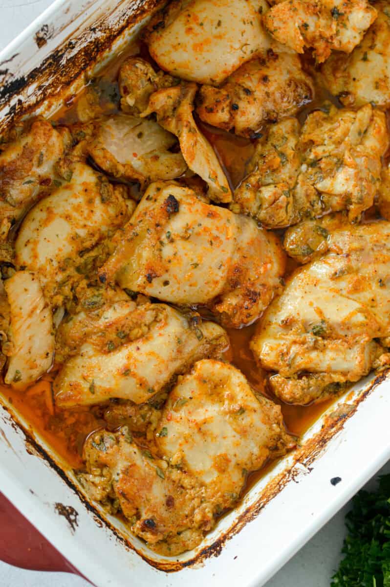 Close up of greek marinated chicken thighs. 