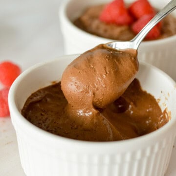 Scooping a spoonful of cottage cheese chocolate mousse.