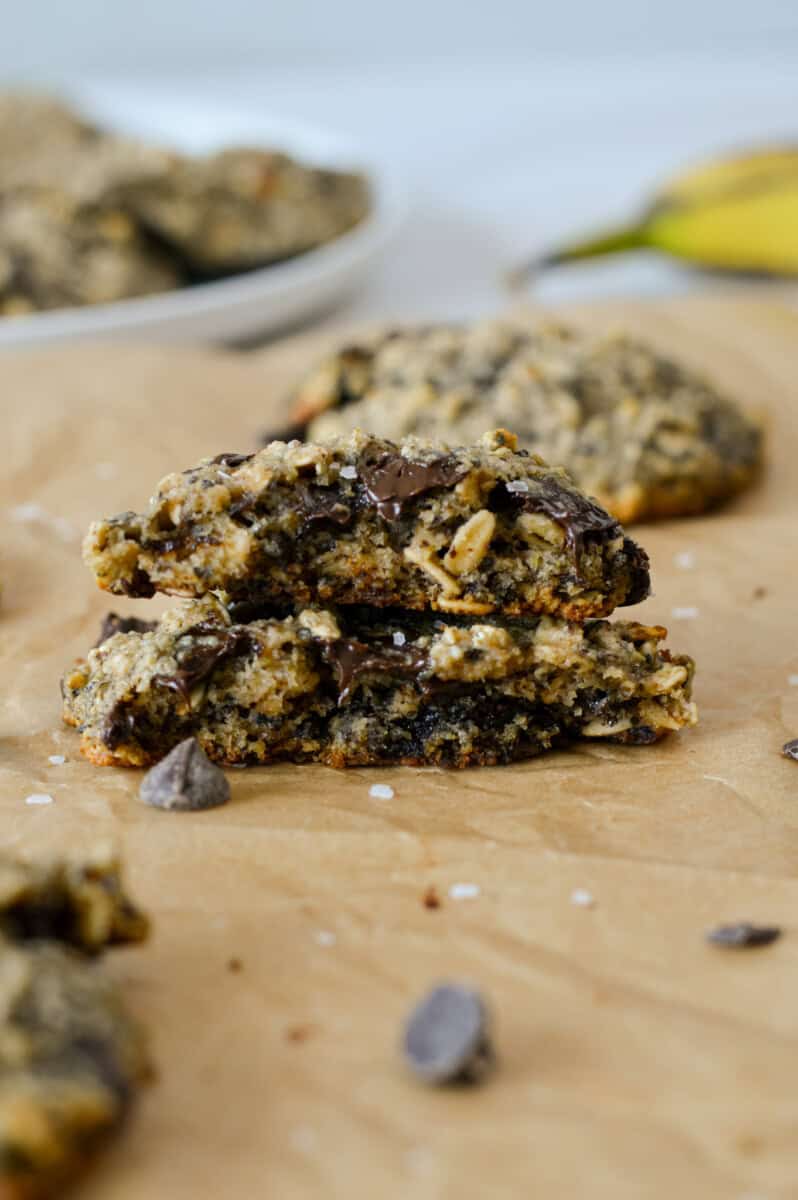 A banana oatmeal chocolate chip cookie split in half and stacked.