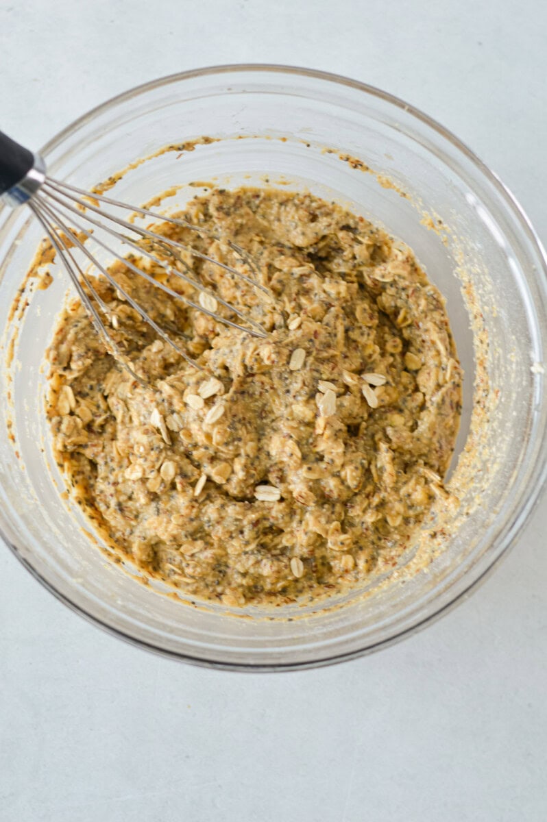 Mixing dry ingredients into banana oatmeal cookie dough.