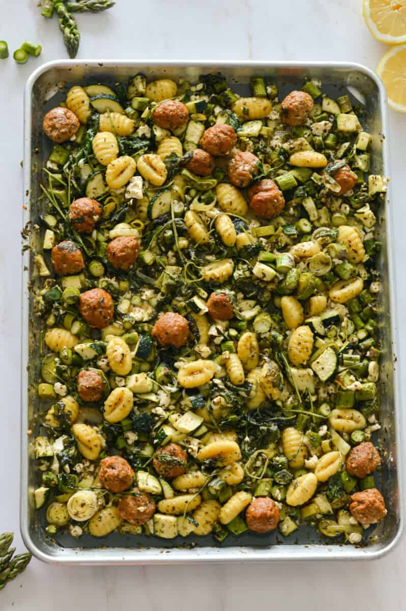 Birds eye of sheet pan gnocchi with sausage and asparagus.