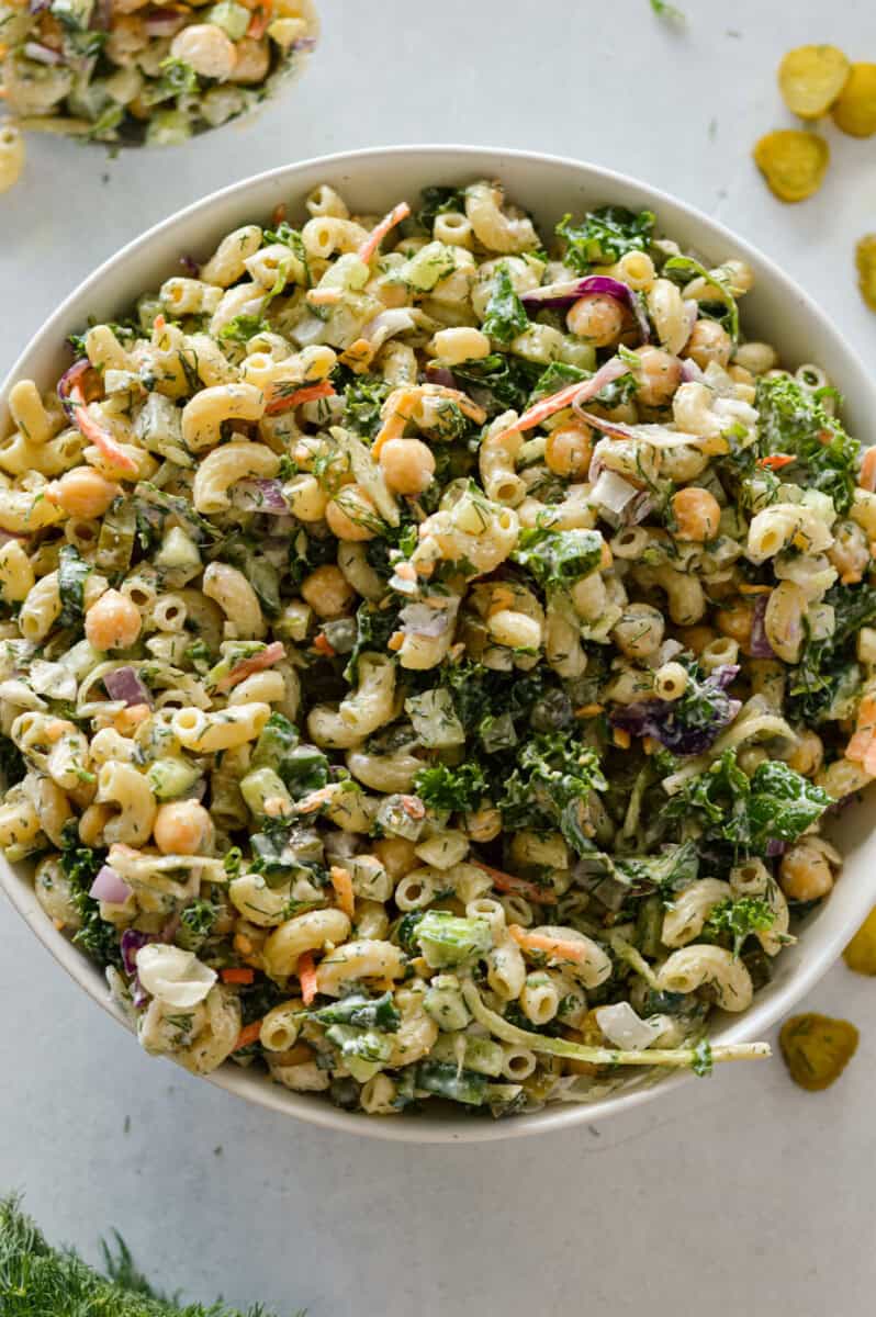 Birds eye of a bowl of dill pickle pasta salad.