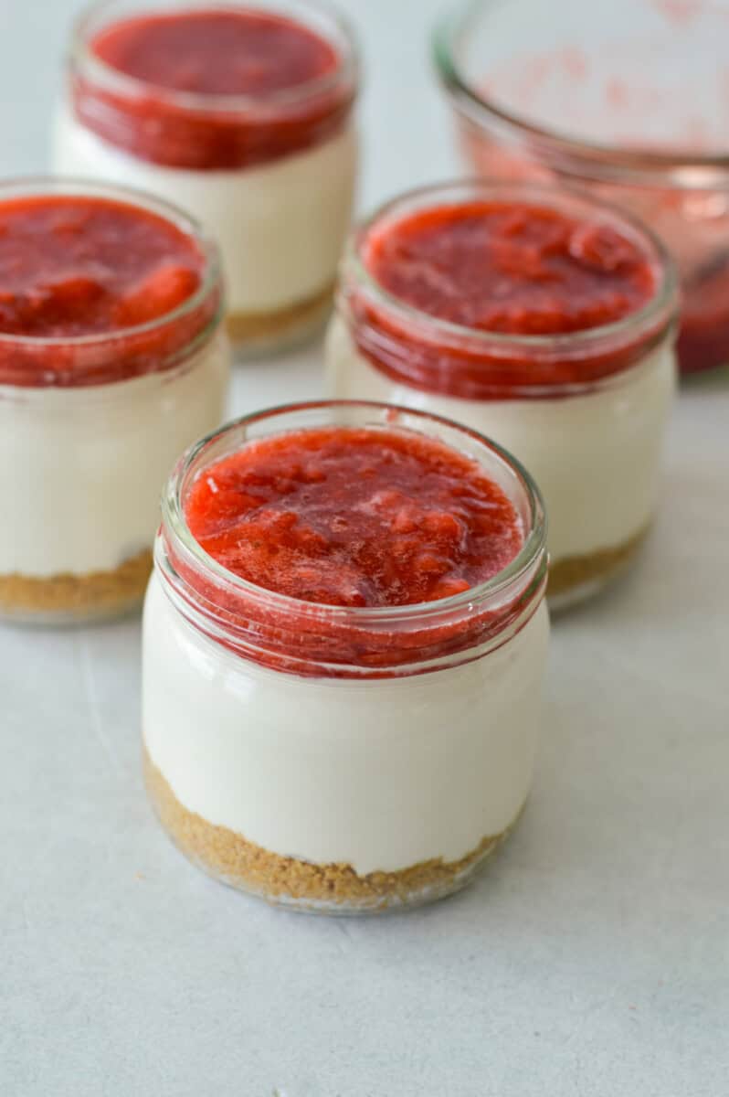 Jars of protein strawberry cheesecake.