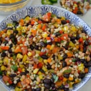 Birds eye of bowl with pearl couscous salad.