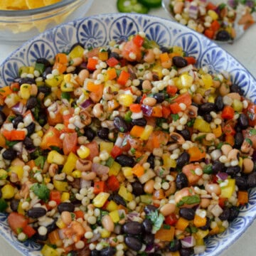 Birds eye of bowl with pearl couscous salad.