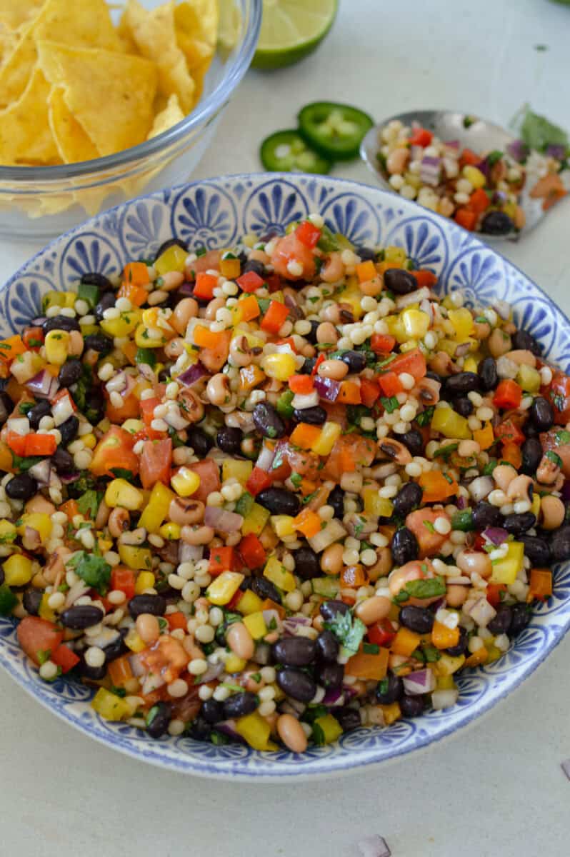 Birds eye of bowl with pearl couscous salad.