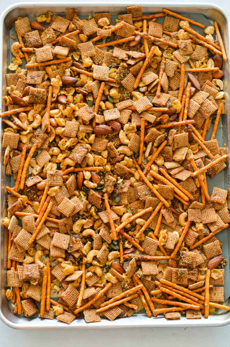 Baked tray of savory snack mix.