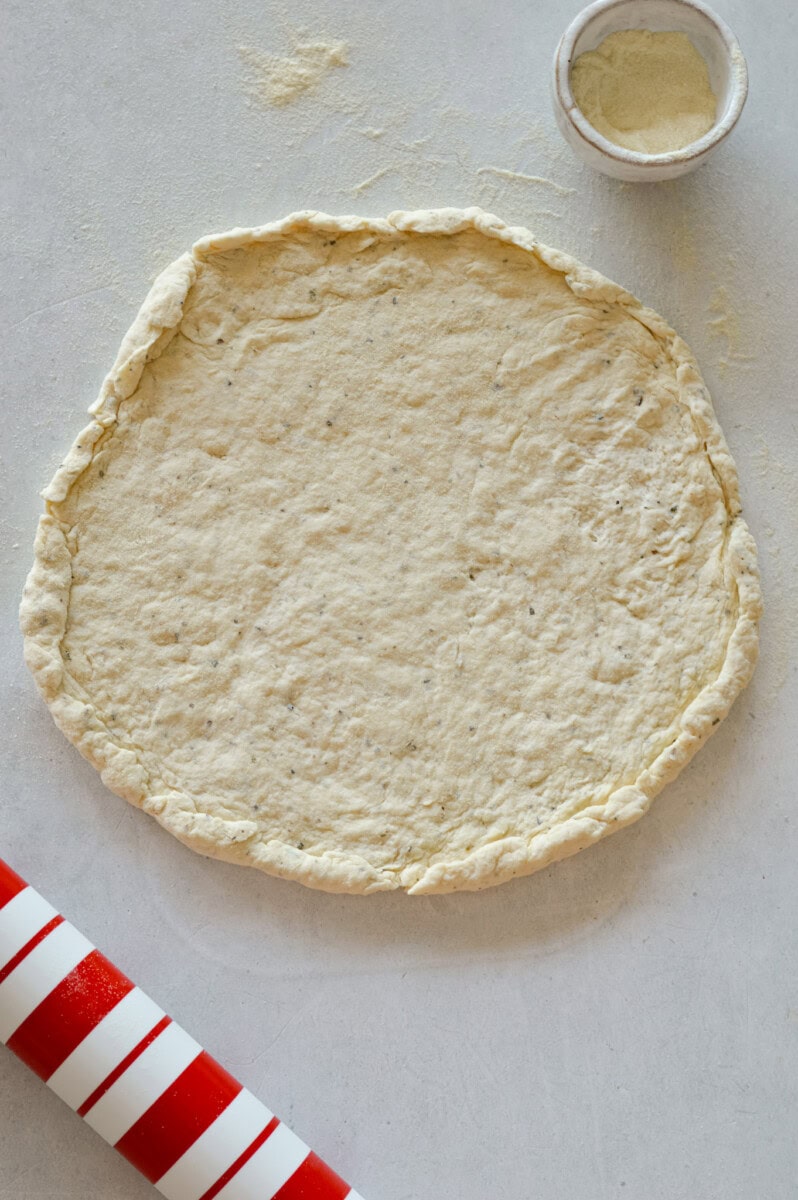 Forming a pizza crust.