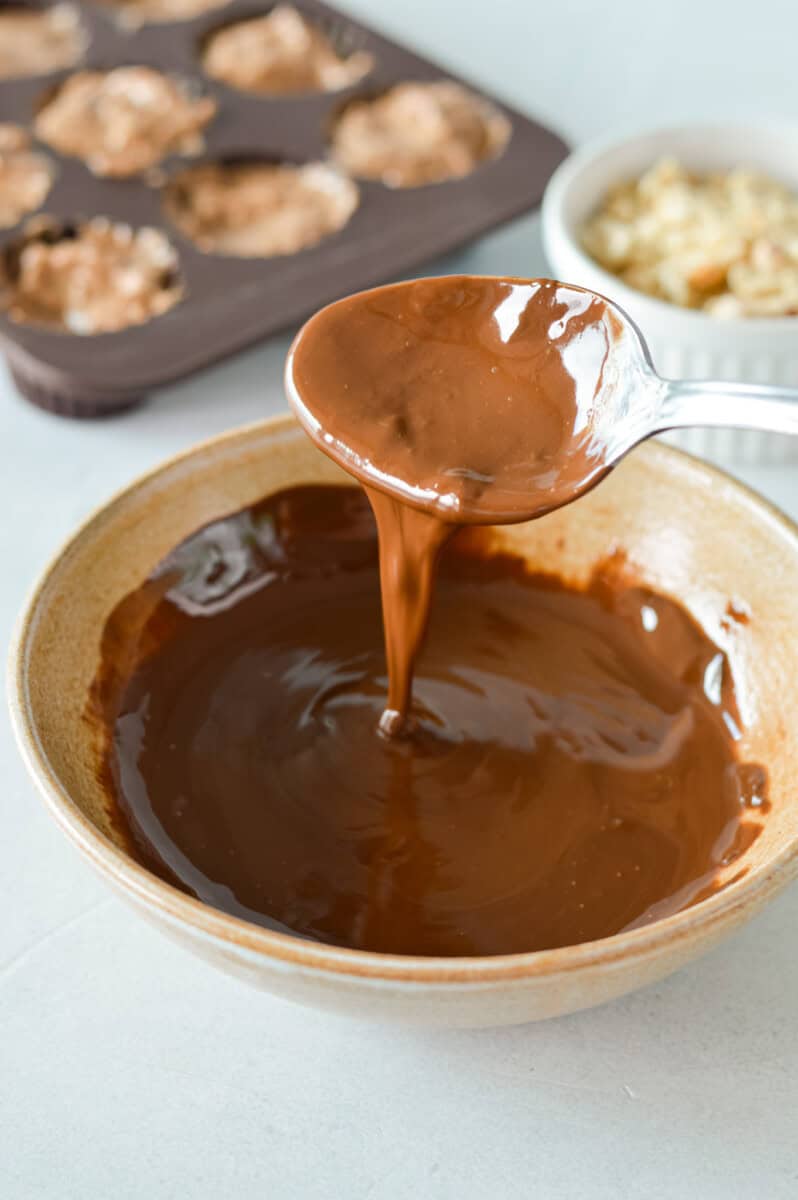 Melting chocolate chips and coconut oil.
