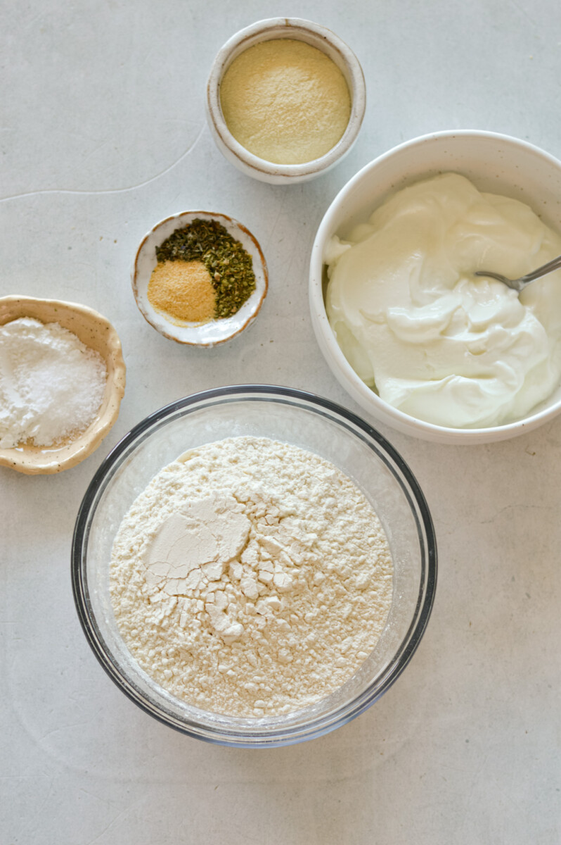 Ingredients including greek yogurt, flour, baking powder and spices.