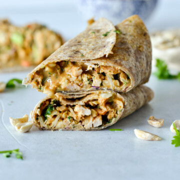 Two spicy peanut tuna wraps stacked.