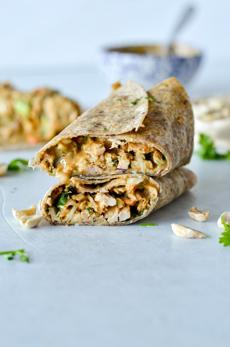 Two spicy peanut tuna wraps stacked.