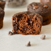 A chocolate and zucchini muffin cut in half.