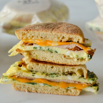 Two halves of a freezer breakfast sandwich stacked.