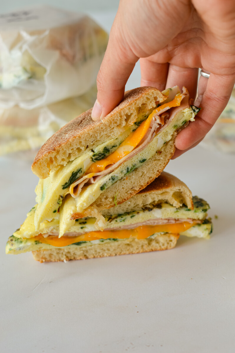 Picking up a freezer egg sandwich.
