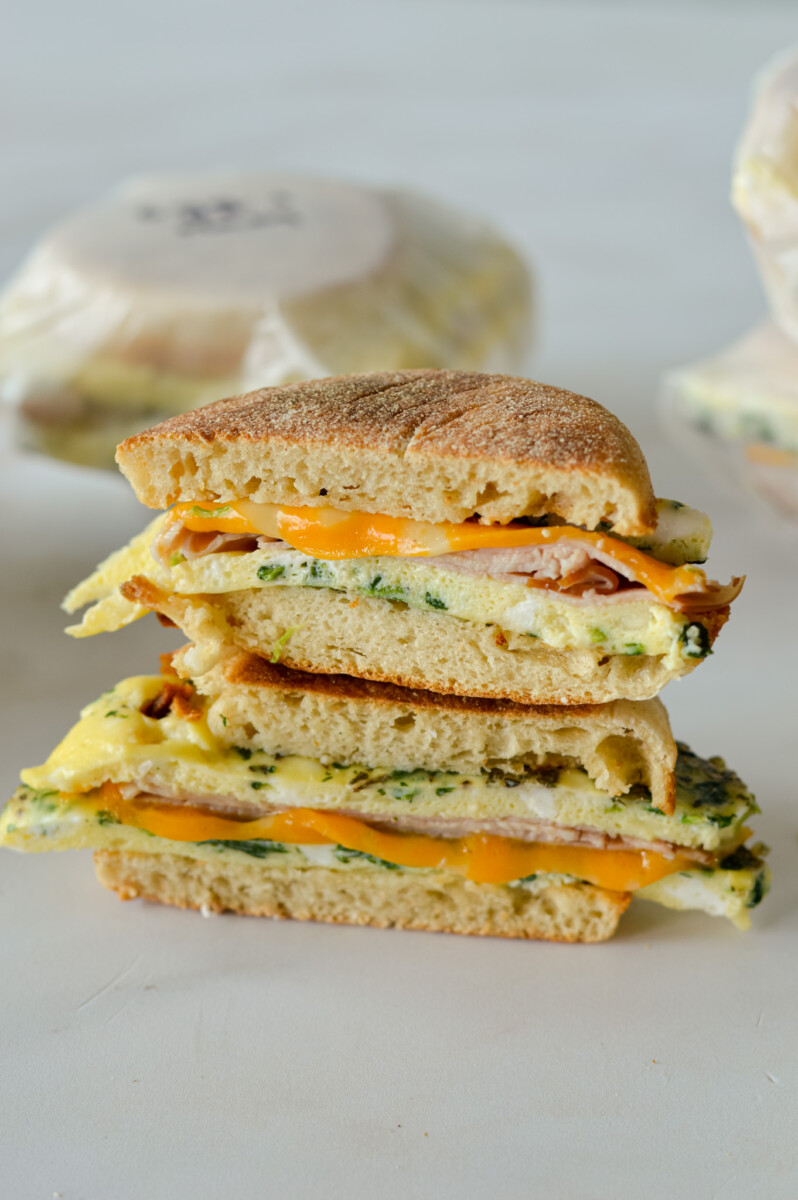 Two halves of a freezer breakfast sandwich stacked.